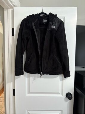 The North Face woman’s Black Hooded fleece Jacket
